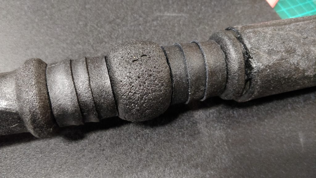 Stippled effect done on one part of the axe handle